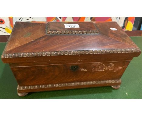 19th century mahogany sarcophagus shaped tea caddy on bun feet.   (B.P. 21% + VAT) 