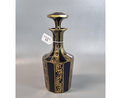 Bristol Blue design glass mallet shaped decanter and stopper with gilded decoration. (B.P. 21% + VAT)  Chip to the bottom of 
