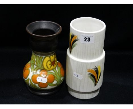         A Gouda Floral Decorated Vase, Together With A Radford Pottery Vase             