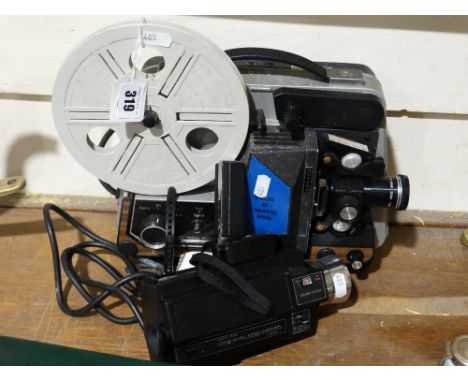         A Vintage Boots Compact Cine Camera Together With A Vintage Projector           