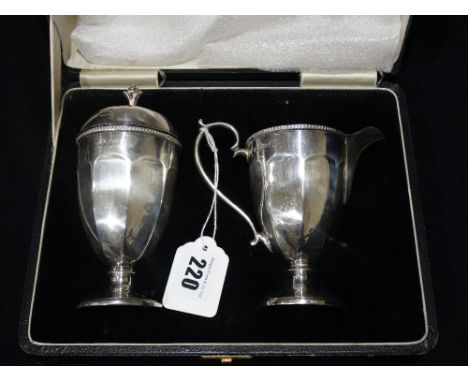         A Cased Pair Of Silver Sugar Shaker & Cream Jug By Ashworth Bros, Hallmarks For Birmingham 1931 & 1935               