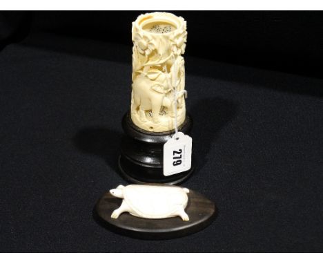         A Carved Bone Lamp Base On A Wooden Plinth (AF)                                 