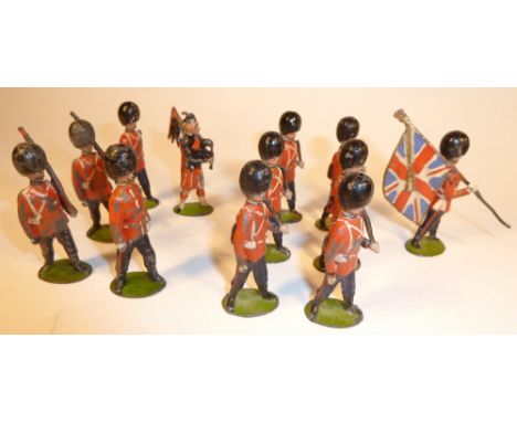 Britains Scots Guards and Pioneers set 75, FIRST VERSION, valise packs, marching at the slope with piper and bemedalled offic