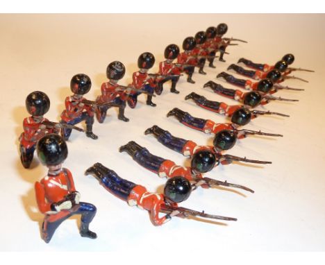 Britains set 124, Irish Guards lying firing FIRST VERSION dated 1.7.1901 with kneeling officer (G, tip of officer’s scabbard 