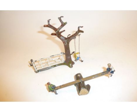 Britains set 19C Tree and Gate with Swing and boy (G, seat replaced) and 618 Boy and Girl on Seesaw G-F) 1938 (7)