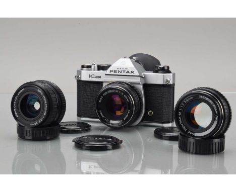 An Asahi Pentax K 1000 SLR Camera, shutter working, meter responsive, body G-VG, with SMC 28mm f/2.8, SMC 50mm f/1.7 and SMC 