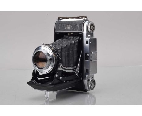 A Zeiss Ikon Ikonta 524/2 Rangefinder Folding Camera, shutter sluggish in slow speeds, rangefinder working, body G-VG, bellow