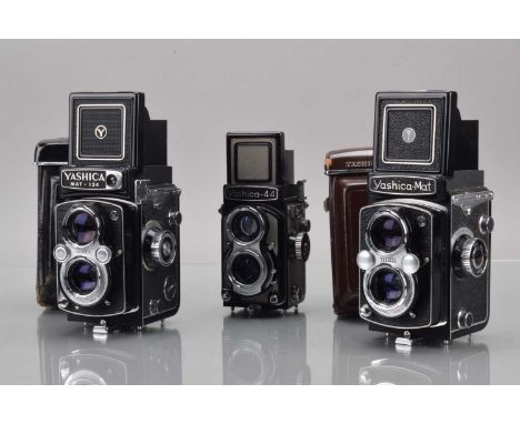 Three Yashica TLR Cameras, a Yashica Mat 124, shutter working, meter responsive, body G-VG, elements G-VG, in EERC, Yashica M