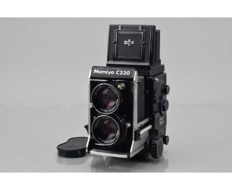 A Mamiya C330 S Professional S TLR Camera, serial no W109929, body G, some surface oxidation to crank & lens mount, bellows G