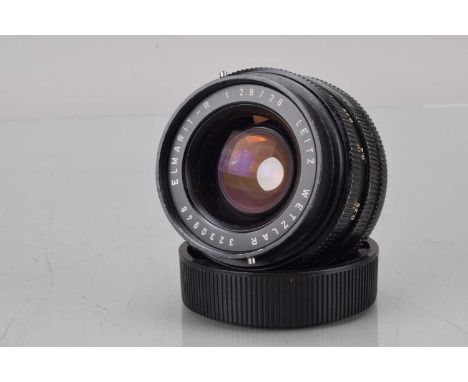 A Leitz Wetzlar 28mm f/2.8 Elmarit-R Lens, serial no 3230948, 1982, 3 CAM, barrel some paint wear to filter ring & grips, ele