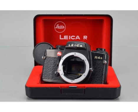 A Leitz Wetzlar Leica R4s SLR Camera Body, black, serial no 1653383, 1984, shutter working,  meter responsive, responsive in 