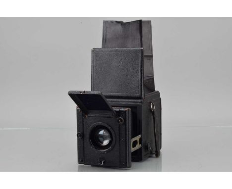 An Ica 4 x 3¼'' Reflex Camera, shutter working, body G, bellows G, viewing hood G, with Carl Zeiss Jena 15cm f/4.5 Tessar len