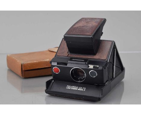 A Polaroid SX-70 Alpha 1 Model 2 Camera, dark brown, untested, fading/wear to leatherette, elements G-VG, with worn case