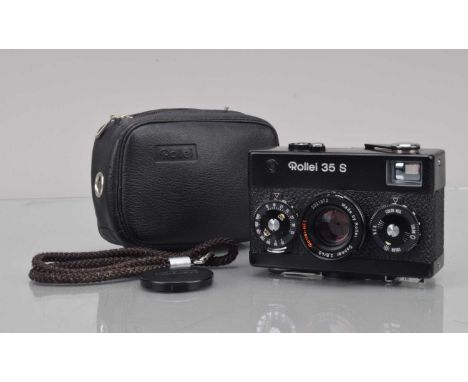 A Rollei 35 S Compact Camera, black, made in Singapore, shutter working, meter unresponsive, body VG, with Rollei HFT 40mm f/