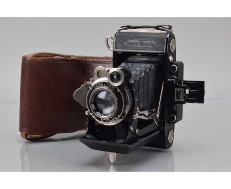 A Zeiss Ikon Super Ikonta 530/2 Folding Rangefinder Camera, shutter working, rangefinder working body G, some paint wear to e