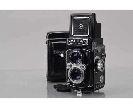A Yashica Mat 124 TLR Camera, shutter working, meter responsive, self timer working, body G-VG, with Yashinon 8omm f/3.5 lens