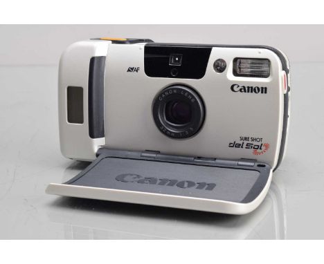 A Canon Sure Shot Del Sol Compact Camera, shutter working, flash working, self timer working, sola panel charges camera, batt