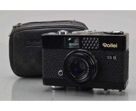 A Rollei 35 B Compact Camera, black, made in Singapore, shutter working, light cell responsive, body G-VG, with Rollei 40mm f