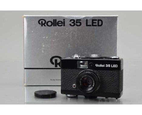 A Rollei 35 LED Compact Camera,  black, made in Singapore, shutter working, light meter untested, body G-VG, with Rollei 40mm