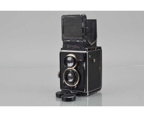 A Rolleiflex I Original TLR Camera,  shutter working, body F-G, paint wear to edges, with Carl Zeiss Jena 7.5cm f/3.5 Tessar 