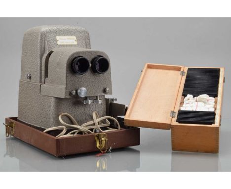 A TDC Stereo Vivid Model 116 Stereo Projector, untested, with 4'' f/3.5 Tridar lenses, 35 & 25mm slide carriers and a Zeiss I
