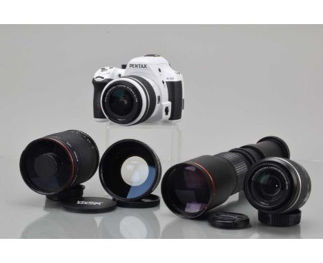 A Pentax K-50 DSLR Camera, white, shutter working, flash working, display working, body VG, with SMC DAL 18-55mm f/3.5-5.6 AL