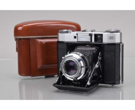 A Zeiss Ikon Super Ikonta 534/16 Rangefinder Folding Camera, shutter working, light cell responsive, rangefinder working, bod