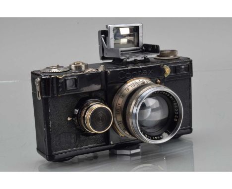 A Contax If Rangefinder Camera, serial no Z 26193, shutter working, rangefinder working, body F-G, brassing to edges, with Ca