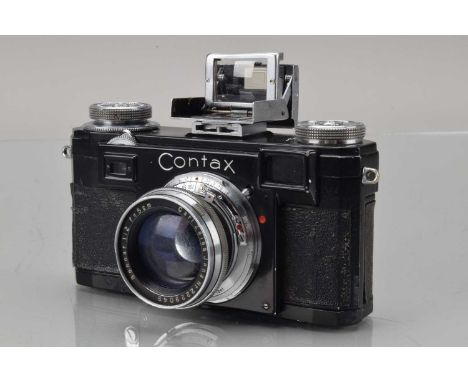 A Zeiss Ikon IIa Rangefinder Camera, black, serial no A 48335, shutter working, rangefinder working, self timer working, body