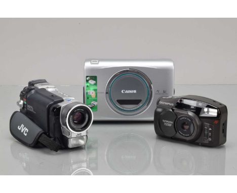 A Camcorder and Compact Camera, a JVC GR-DVL166EK digital camcorder, powers on, displays working, zoom working, body G-VG, el