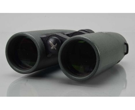 A Pair of Swarovski 10 x 42 Binoculars, missing type plate from focusing knob, body G, missing inner ring from/H eye cup, ele