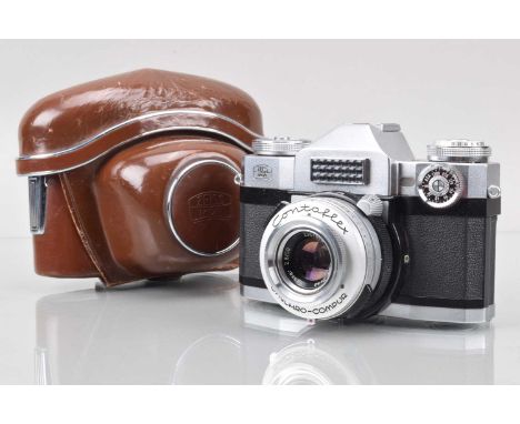 A Zeiss Ikon Contaflex Super Camera, shutter sluggish/sticking in slow speeds, light cell responsive, body G-VG, with Carl Ze
