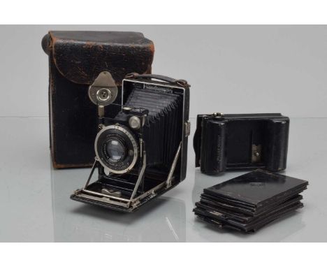A K.W. Patent Etui 6.5 x 9cm Folding Bed Plate Camera,  black, F Deckel Compur shutter working, aperture blade slipped, not f