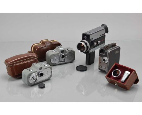 Four Zeiss Ikon Cine Cameras, a 16mm Zeiss Ikon Movikon K, motor runs, surface oxidation to strap lugs, brassing to front & b