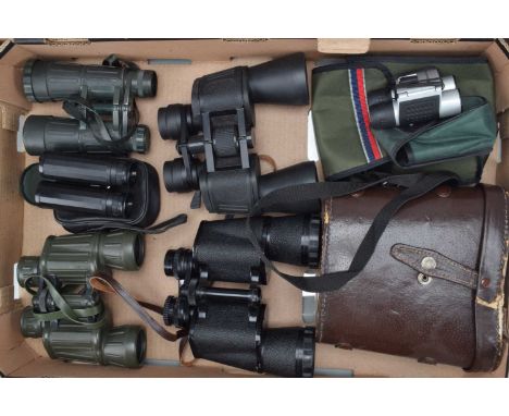 A Group of Binoculars, a pair of Bushnell 10-70x70, Sussex Armoury Explorer 8 x 40, Bressar Linear 8 x 42 (missing pivot cap,