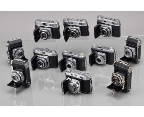 A Tray of Kodak Retina Folding Cameras, a Retina type 118, shutter working,  two Retina I 148, black & chrome, black shutter 