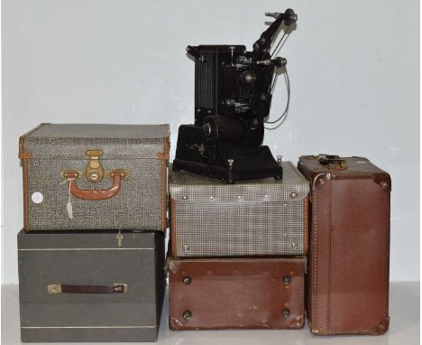 A Group of Specto Cine Projectors. a Specto Type A, Type DE, two XA, two XCA, one XD, all set up for 16mm, a Type A, Type B (