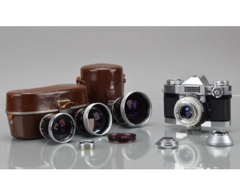 A Zeiss Ikon Contaflex Super SLR Camera, shutter working, light cell responsive, body G-VG, with Carl Zeiss 50mm f/2,8 & 115m