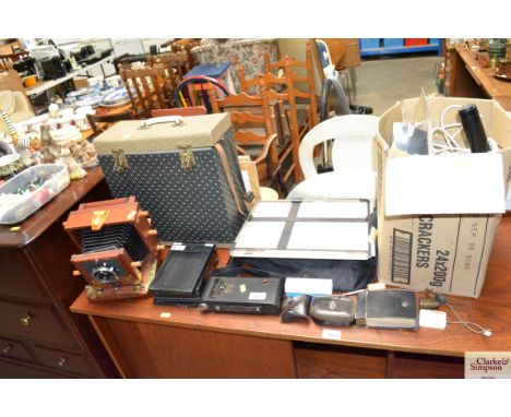 A Schneider Kreuznach camera together with various accessories to include a stand; lights etc