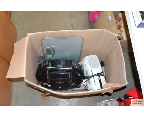 A box containing Hitachi portable radio, one other radio, set of scales etc.