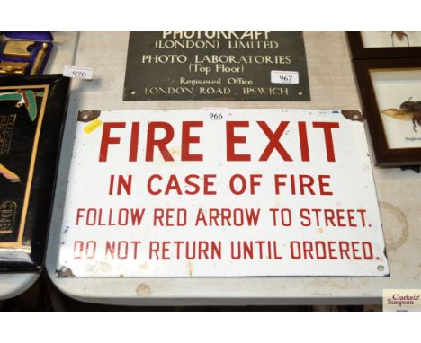 An enamel fire exit sign