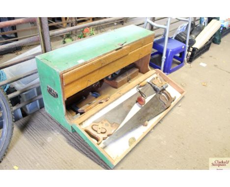 A green painted carpenters tools chest and contents of tools 