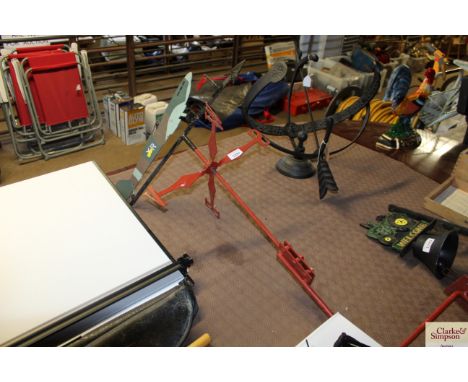 A weather vane with spitfire decoration