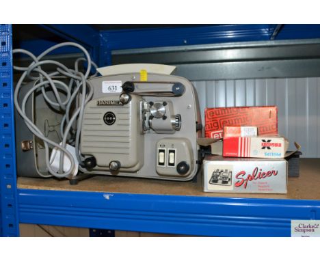 A Hanimex projector and accessories