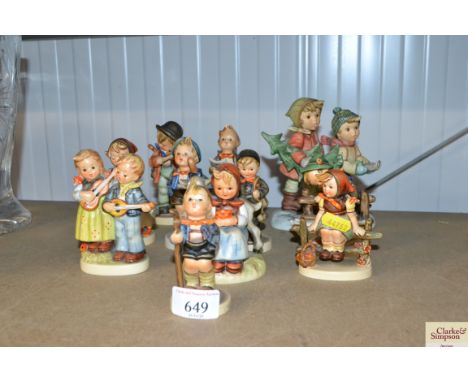 A collection of Goebel figures