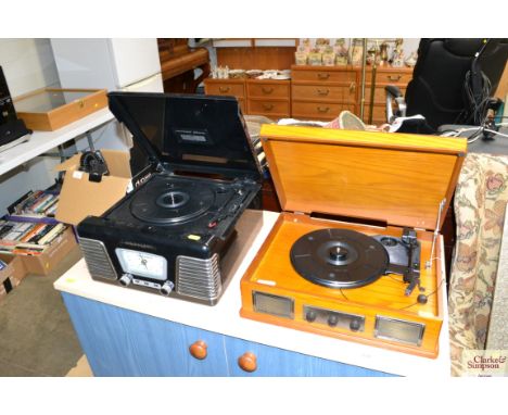 A vintage style record player and a Crosley radio and record player