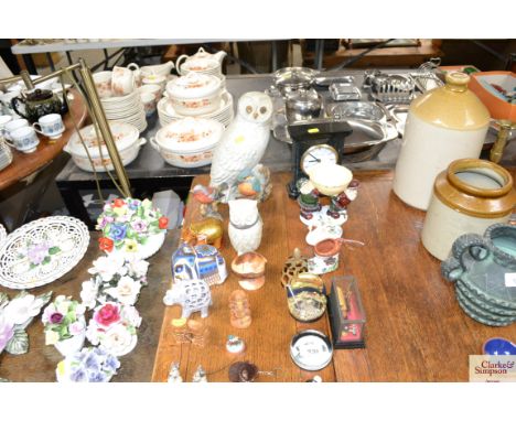 A Churchill mantel clock together with various ornaments; paper weights etc