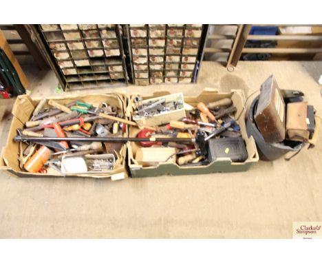 Two boxes containing various tools and a bucket with contents