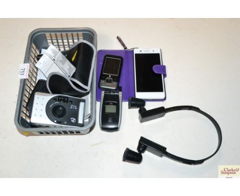 A Sony mobile phone; various other phones; camera etc