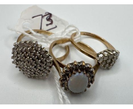 Three diamond cluster rings one with a opal sizes H M N 7.1 gms inc.